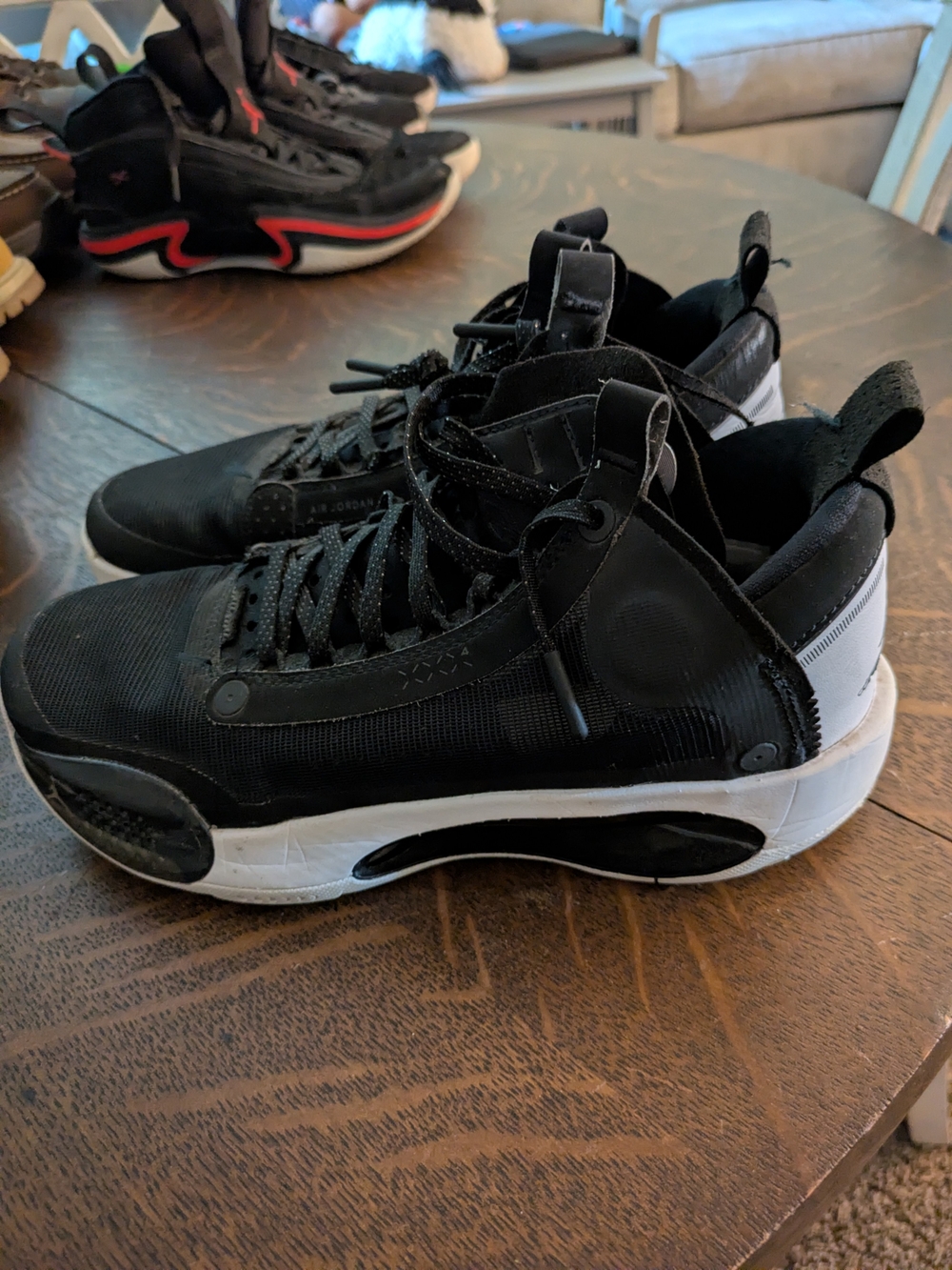 Jordan Black and White Mid-Top Basketball Sneakers